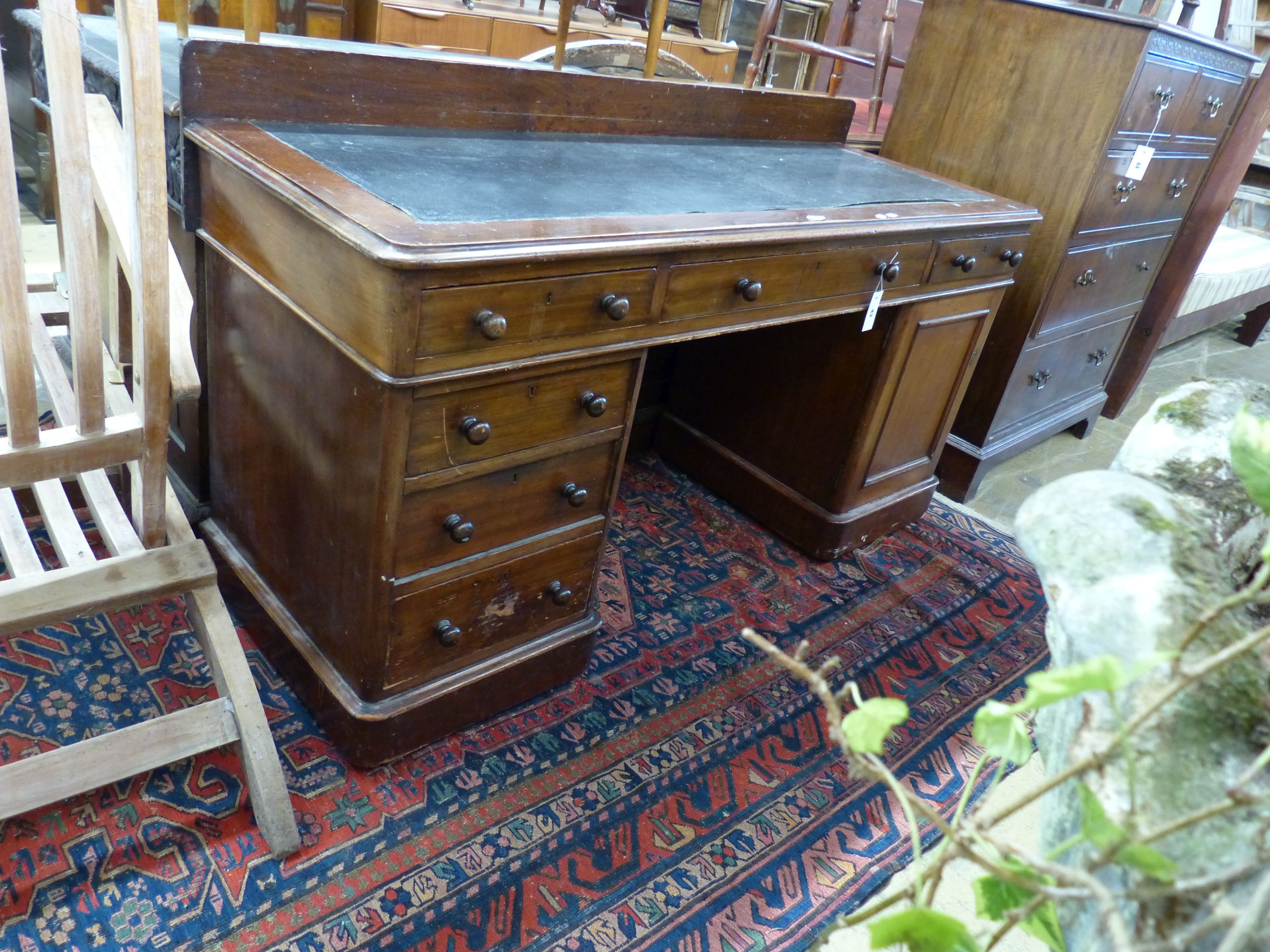 A late Victorian mahogany pedestal desk, length 152cm